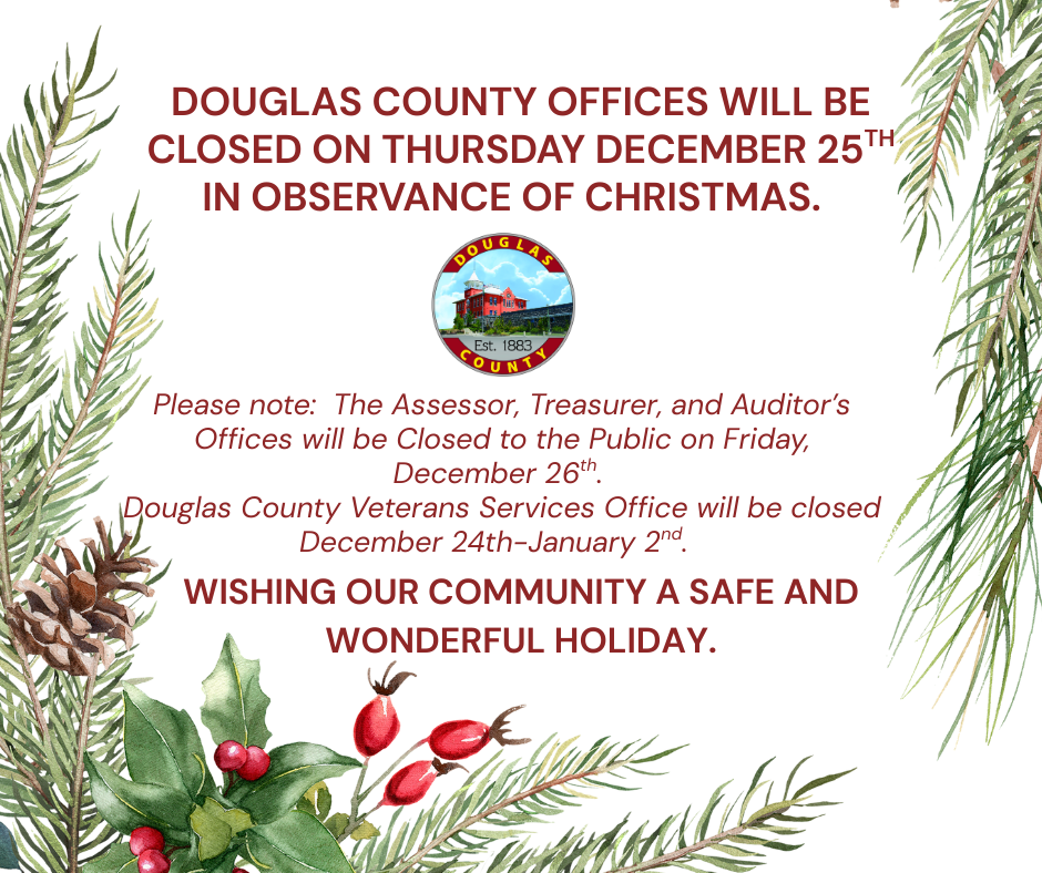 Pine tree branches with holiday closure notice 