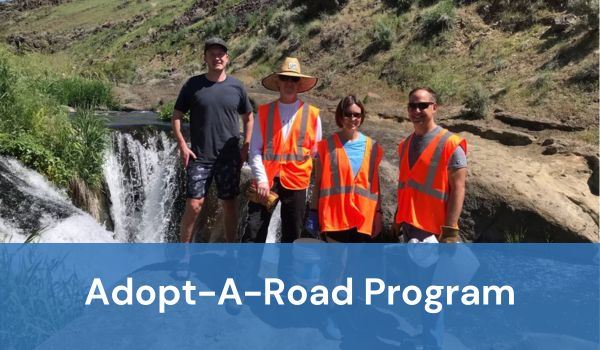 Photo of a sign with word "Adopt-A-Road Program"